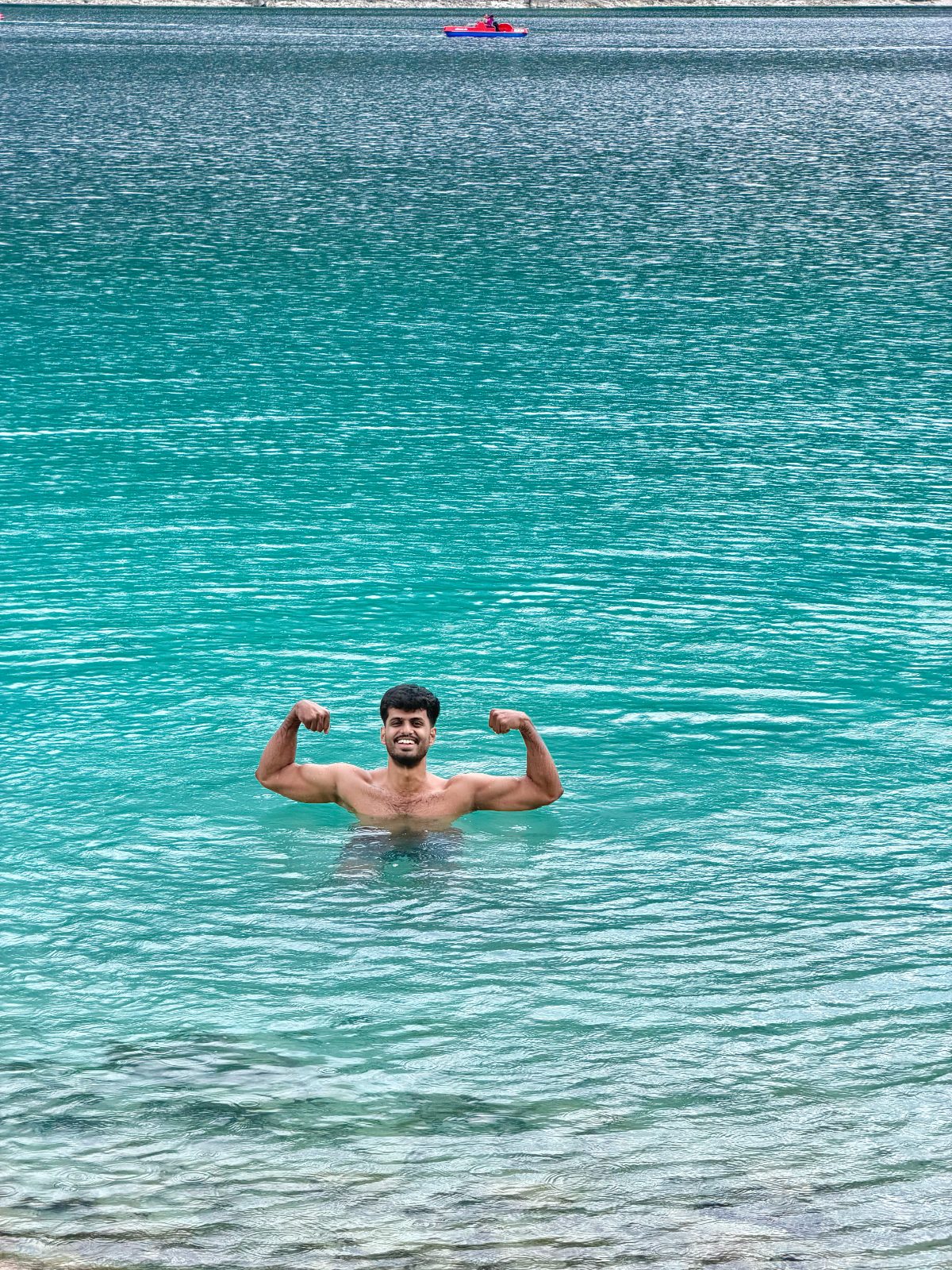 Flexing in the cold turquoise water of Eibsee
