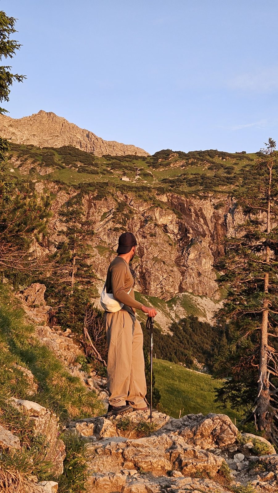 Standing on a rocky ridge in golden light